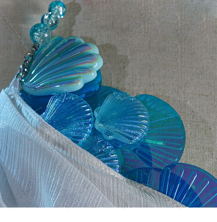 L.L. 島主衣装の貝殻モチーフ装飾アップ。海辺意匠のデザイン再現を確認。