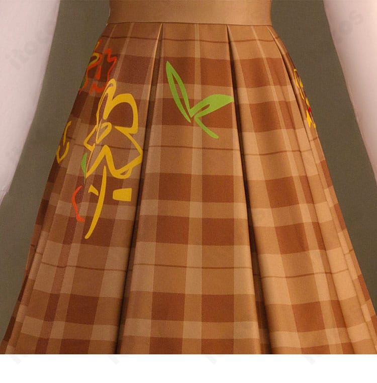 スカート部分の装飾ディテール。秋色の発色とAラインの広がりを捉えたカット。