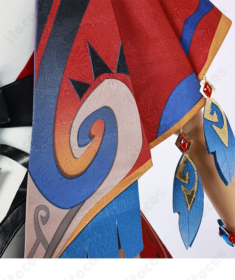 披肩背面のアップ。縁取りのカーブと装飾モチーフの中心配置を強調