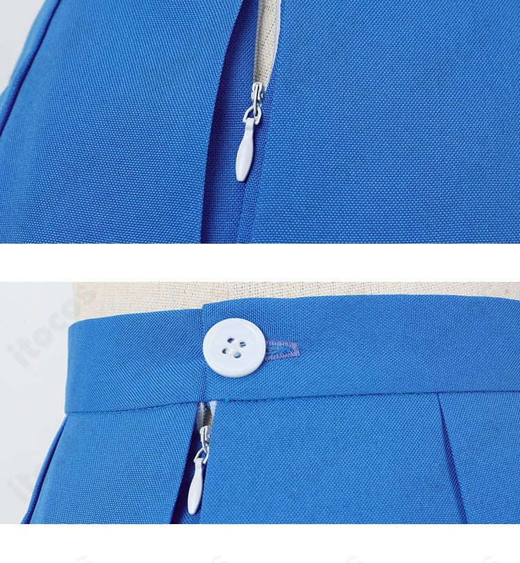 スカートのボタンとチェーン装飾のクローズアップ。細部まで丁寧に再現された意匠