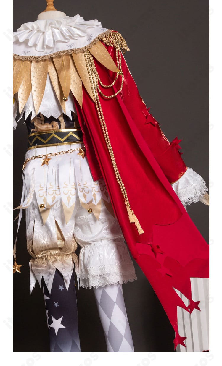 背面裾の装飾ディテール。裾の切り替え、刺繍ライン、フリンジの質感を強調した近接写真。