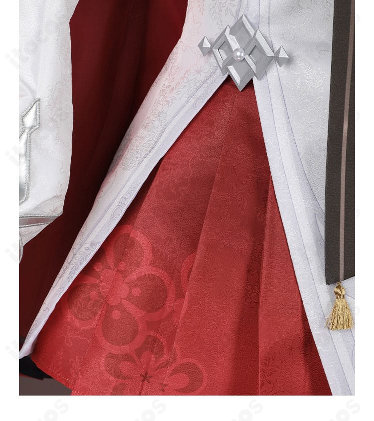 スカート前面の装飾ディテール。パネル切替と金色モチーフ、端処理の丁寧さが分かる。