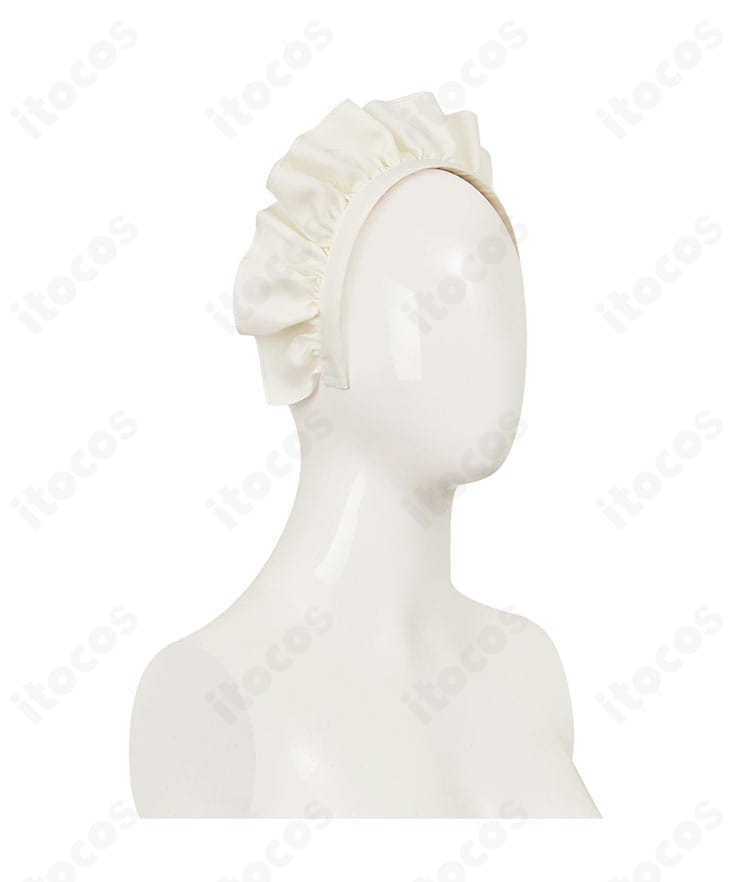 ヘッドドレス側面のアップ。輪郭のシルエットと装飾の重なりを示す。