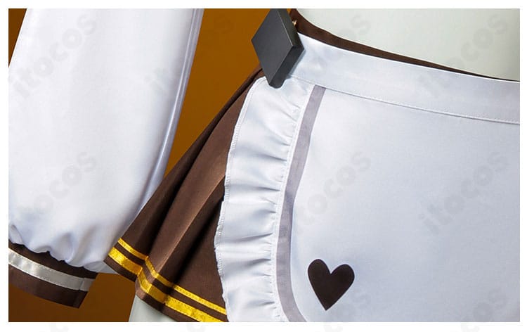 スカートとエプロンの装飾クローズアップ。裾ラインと装飾の細かさ、素材感が分かる画像。