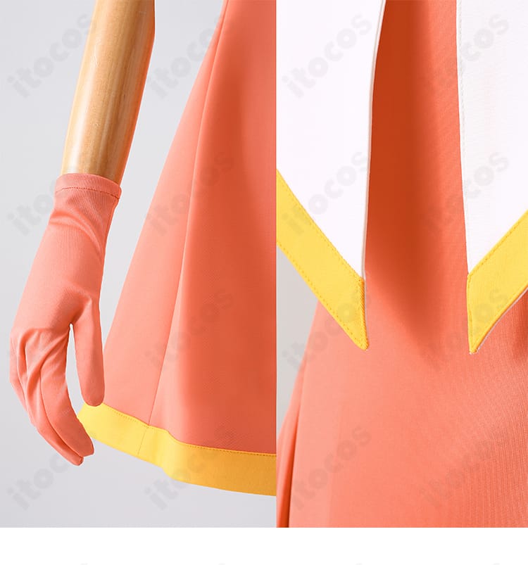 衣裾と手袋のディテール。ヘムの始末と手袋の伸縮性、コーデ一体感を示す小物の仕上がり。