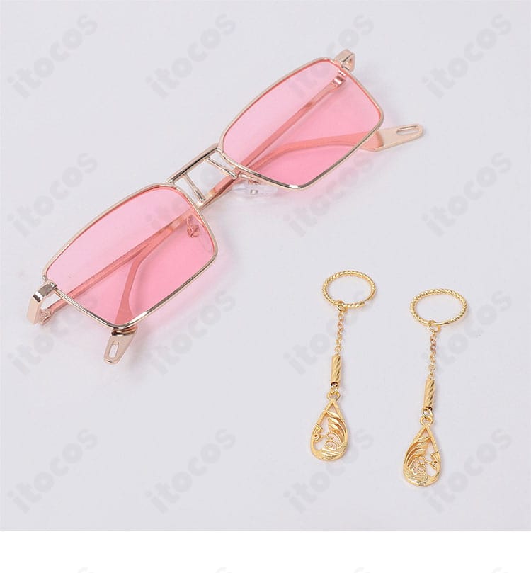 メガネと耳飾りのアクセサリーディテール。光沢と形状を明確に捉えたアップ。