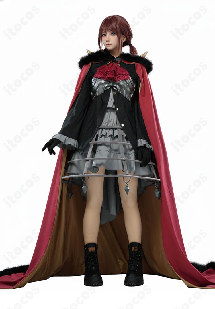 モデル着用の正面コーディネート。マントとスカーフの配置、全身バランス