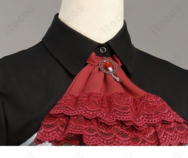 スカーフの結び目と装飾のアップ。色味と質感の再現