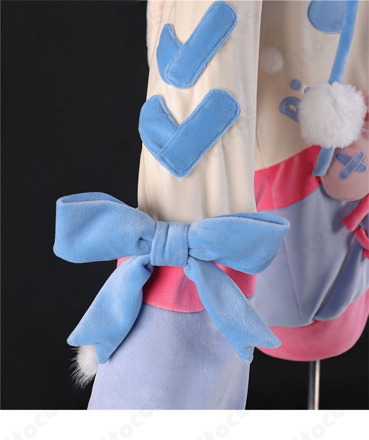 外套袖口の大きめリボン装飾の拡大