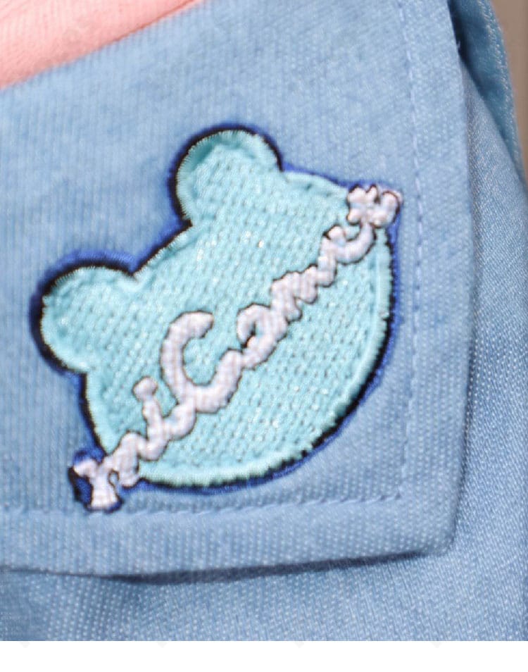 さくらみこ miCometブランド第二弾衣装の刺繍風モチーフ装飾のクローズアップ