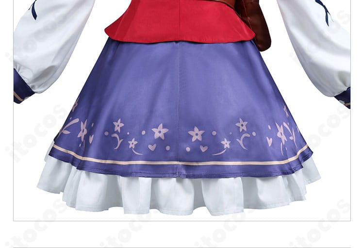 スカート背面のフリルとライン。後ろ姿に奥行きを与える意匠