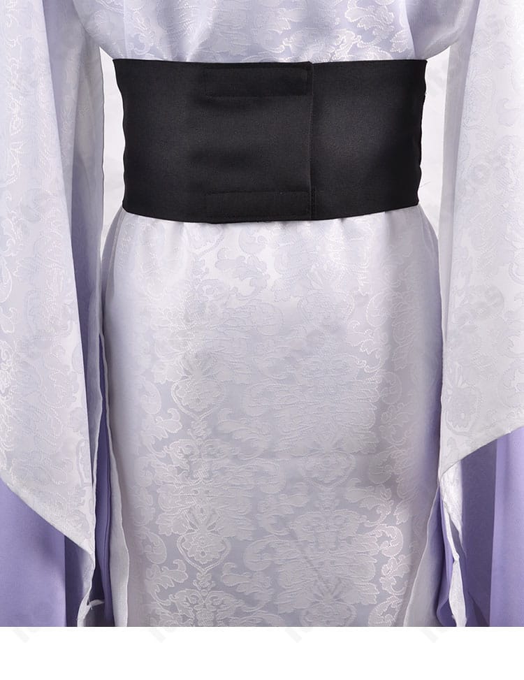 腰部コルセットベルトの装飾詳細。留め具の意匠とステッチ、レイヤーの重なりを示す接写。