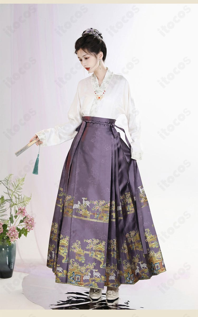 紫色スカートの刺繍と装飾の接写。糸色のコントラストと縁取りの丁寧な仕上げ。