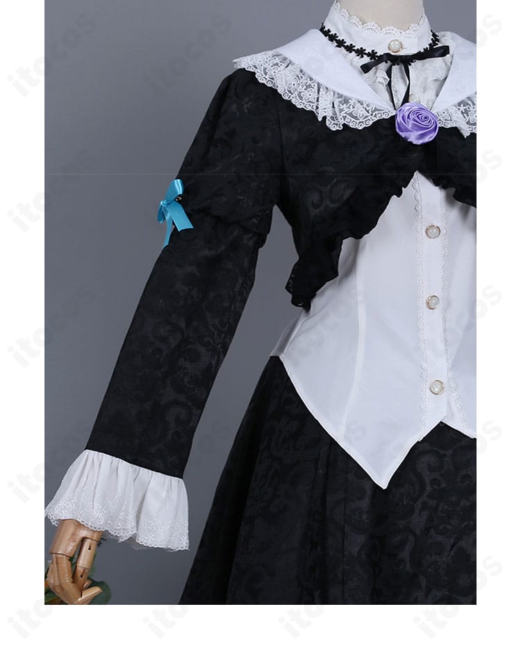 肩と袖の装飾ディテール。フリルとレースの重なりを強調したクローズアップ。