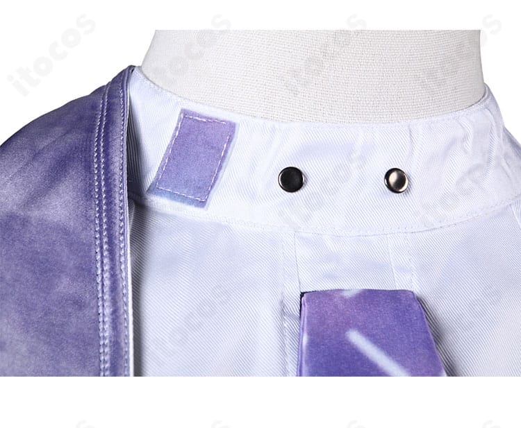 シュエン衣装の襟元アップ。精巧な刺繍とリボン装飾の質感を示すディテール。