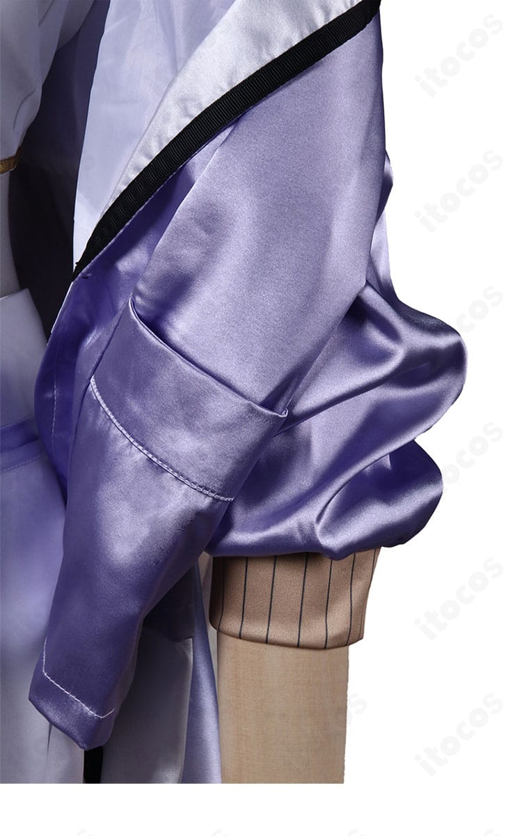 シュエン衣装の袖口装飾。精密な意匠とカフスラインを捉えたクローズアップ。