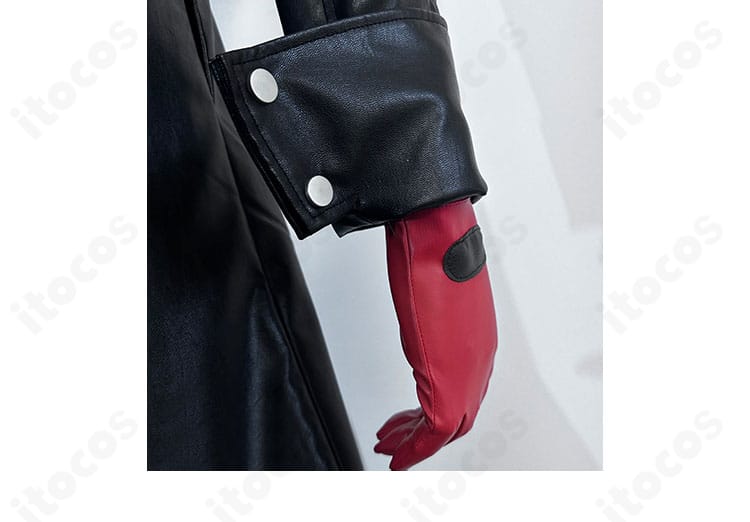 袖口と赤い手袋の装飾ディテール。コントラストと質感の見え方に焦点。