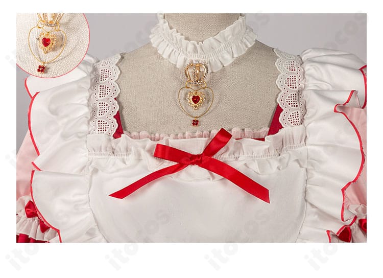 ゴールデングロー衣装の刺繍風モチーフと花柄装飾のクローズアップ。細部の質感が伝わる画像。