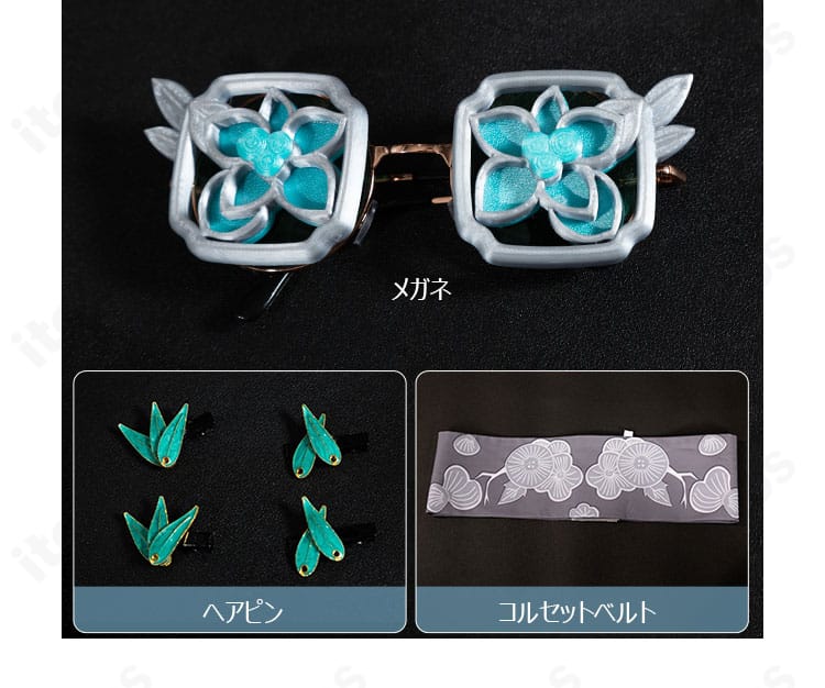 メガネと髪飾りの意匠を示すディテール（骨董商 墨韻）