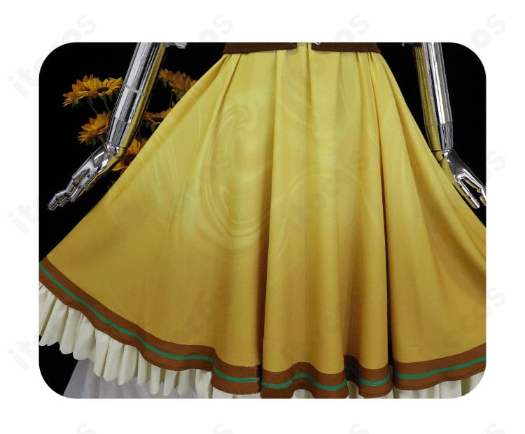 白石杏衣装のスカート装飾ディテール。可愛らしい花柄トリムとリボンの質感を捉えたクローズアップ。